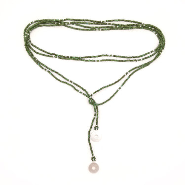 Collar enredable verde turquesa detalles plata.